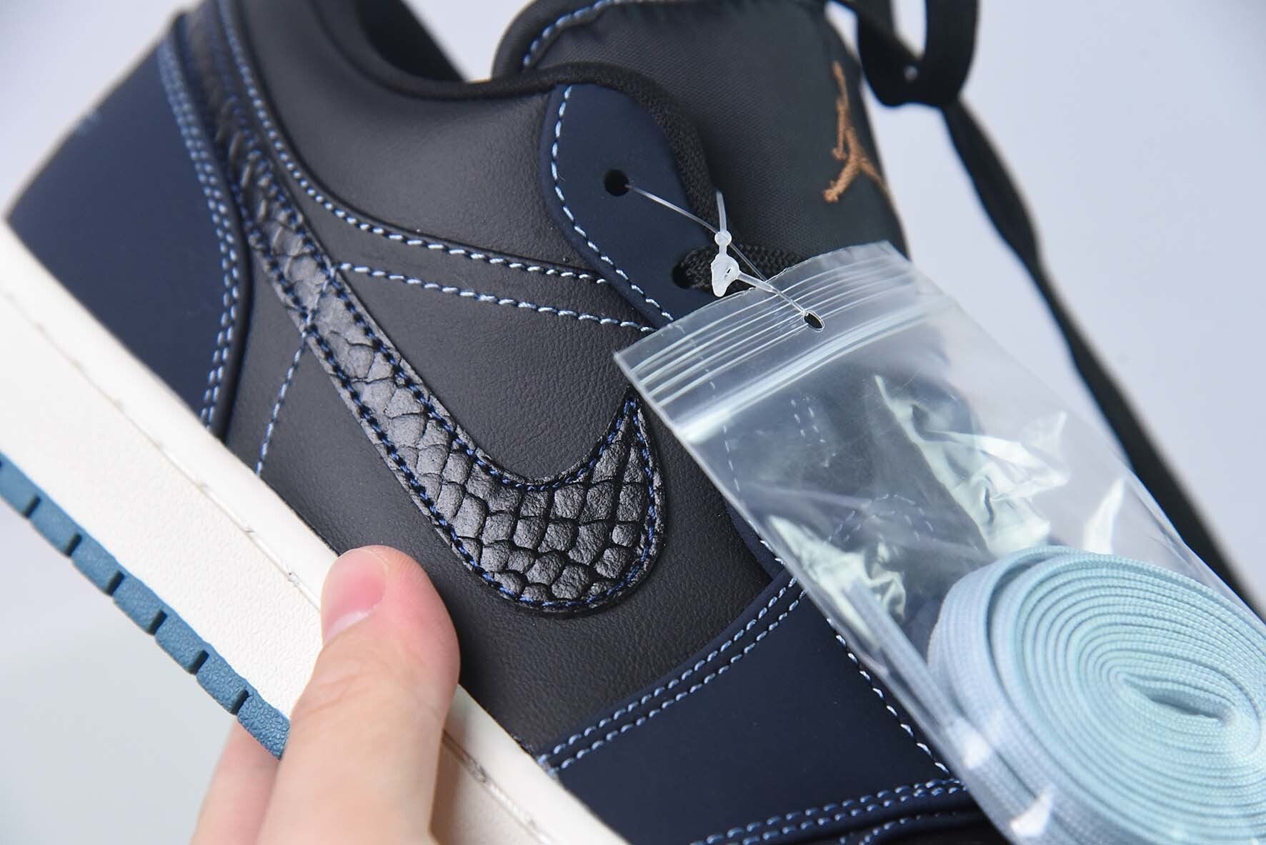 Jordan 1 Low Dark Obsidian Snakeskin