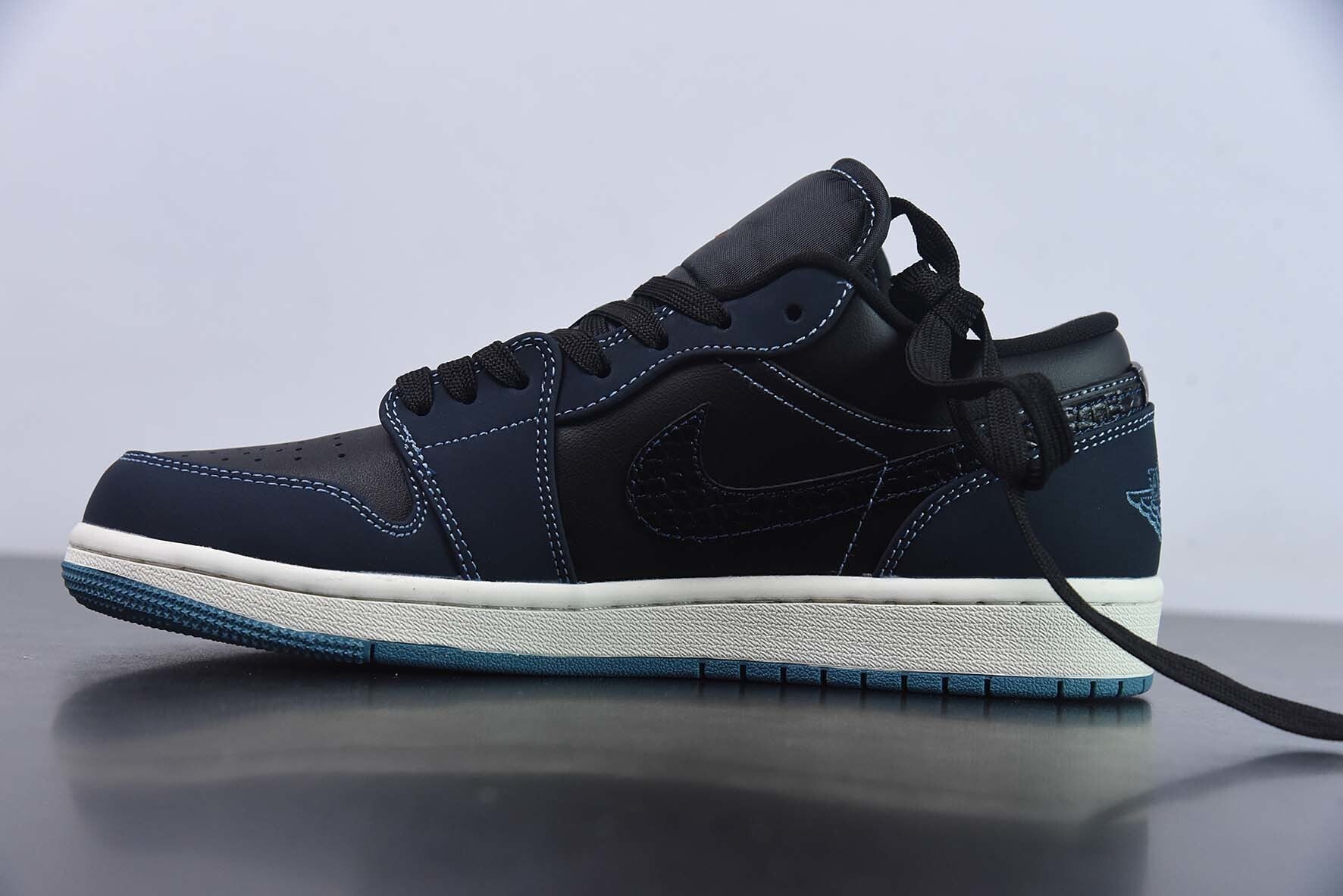 Jordan 1 Low Dark Obsidian Snakeskin